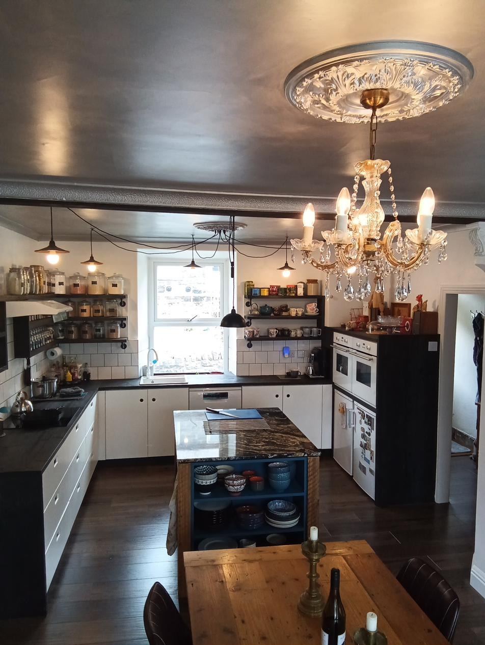 Hand painted white kitchen with solid stained wood worktops